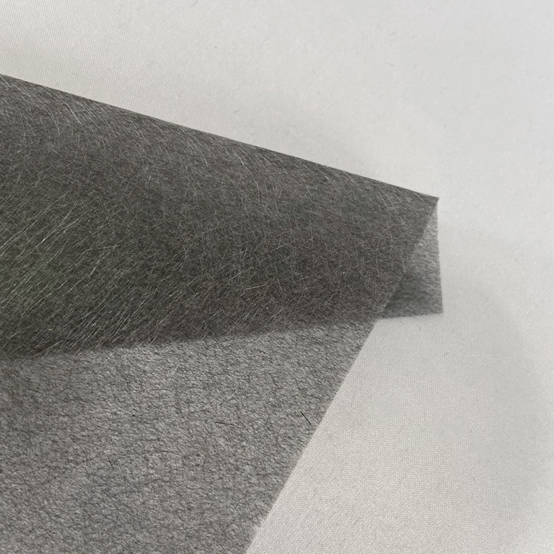 Kol- och glashybridfilt/glasfiberduk för vindkraft med elektrisk värmealstring